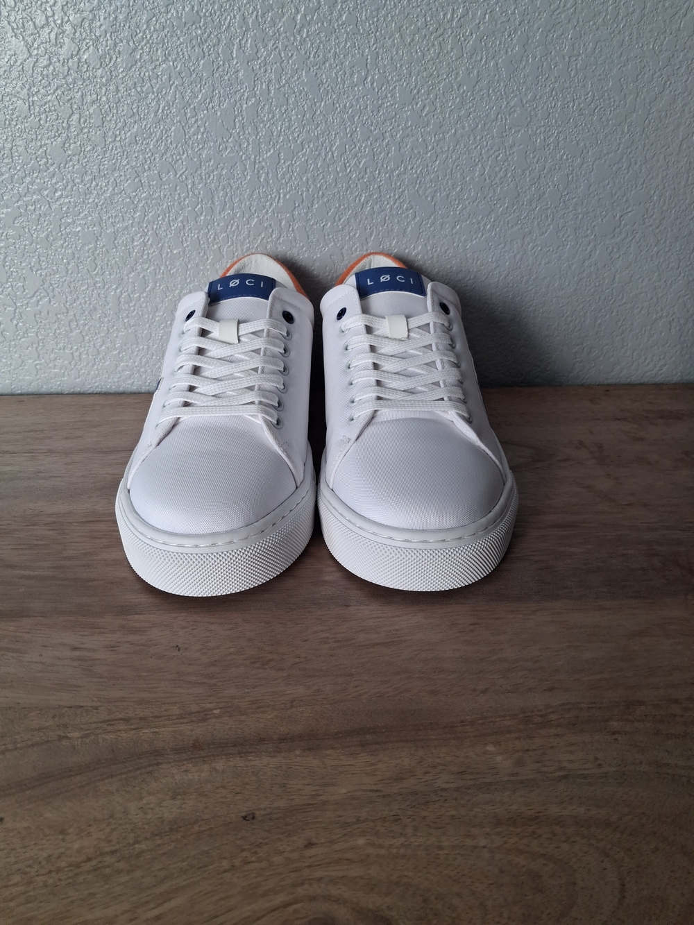 Loci White Low-Top Sneakers with Blue Heel Tab and Orange Accent. No Box